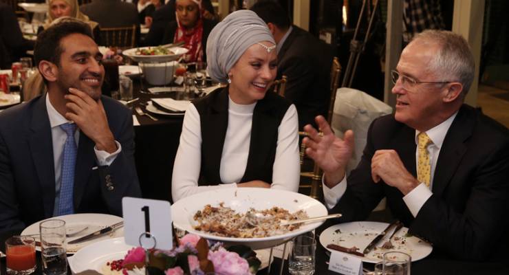 Waleed Aly and Susan Carland speak with Malcolm Turnbull at last week's Iftar dinner at Kirribilli House.