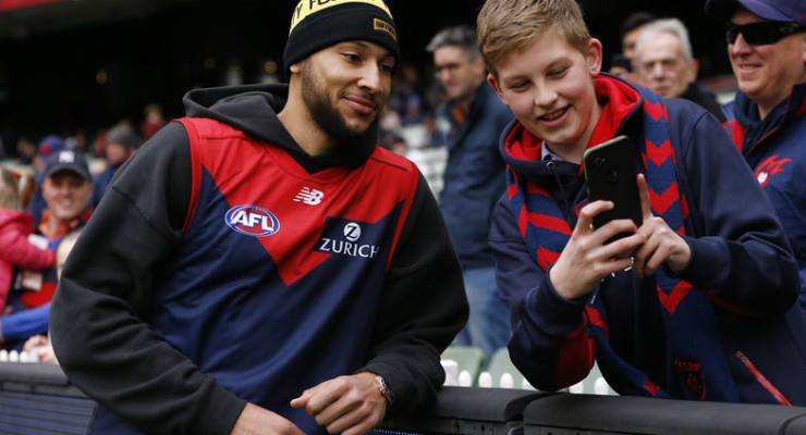 NBA star Ben Simmons attends a Melbourne Demons AFL game.