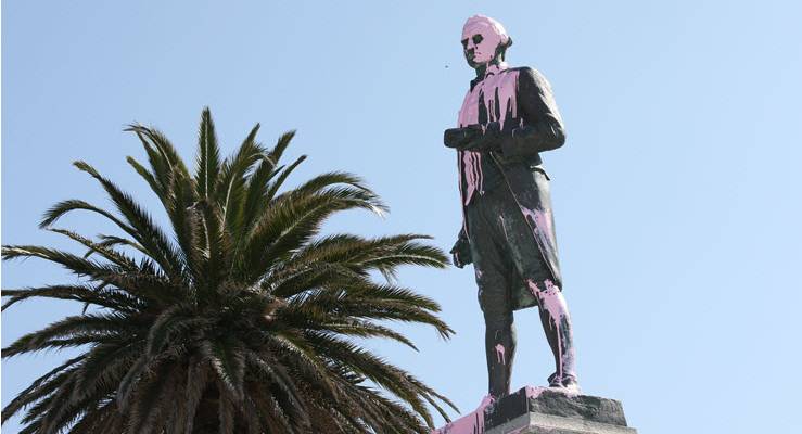 captain cook statue covered in pink paint