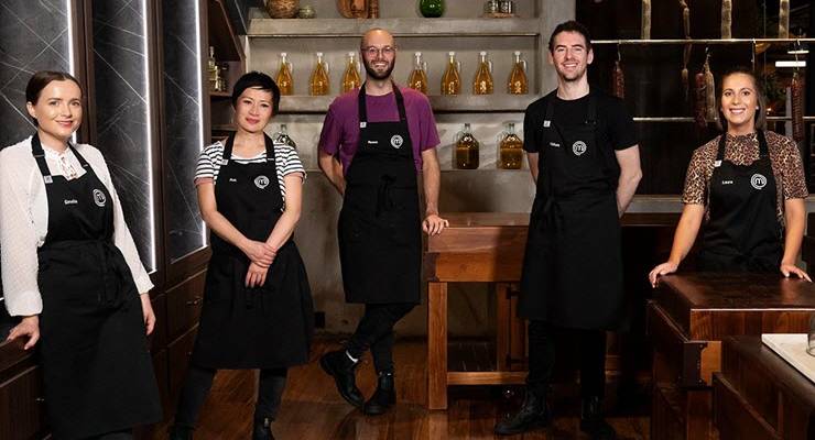 masterchef contestants in black aprons