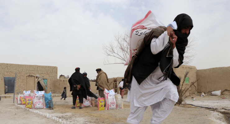 People receiving rations in Afghanistan, February 2022 (Image: AAP/Stringer)