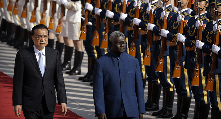 Chinese Premier Li Keqiang and Solomon Islands Prime Minister Manasseh Sogavare in Beijing, 2019 (Image: AAP/Mark Schiefelbein)
