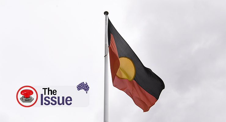 The Aboriginal flag seen in Canberra, 2022 (Image: AAP/Lukas Coch)