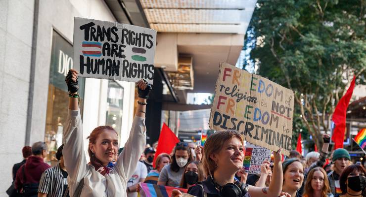 Protesters at a rally in Brisbane, Queensland (Image: AAP/Joshua Prieto/ SOPA Images/Sipa USA)