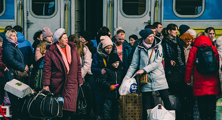 Ukrainians waiting at the Lviv train station (Image: AAP/Lara Hauser/SOPA/Sipa USA)