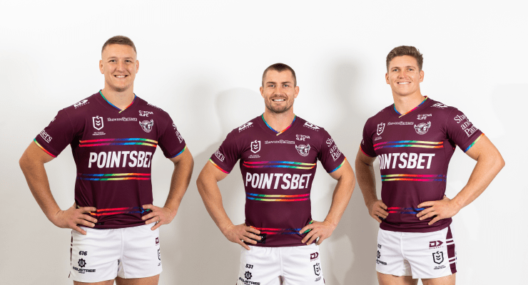 Manly players Sean Keppie, Kieran Foran and Reuben Garrick happily wearing the pride jersey (Image: AAP/Supplied by Manly Warringah Sea Eagles)