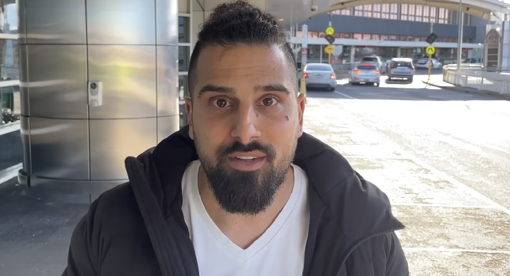 Far right figure Avi Yemini after being denied boarding a flight to New Zealand (Image: YouTube/Avi Yemini)