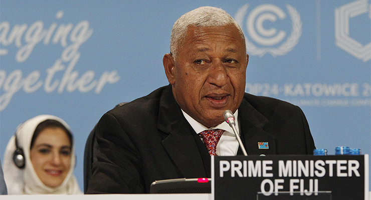 Fiji's Prime Minister Frank Bainimarama addresses representatives at COP24 (Image: AAP/AP/Czarek Sokolowski)
