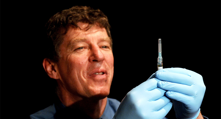 Professor Ian Frazer preparing to administer Gardasil, the world's first cervical cancer vaccine, 2008 (Image: AAP/Mick Tsikas)