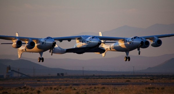 Virgin Galactic Virgin Galactic VSS Enterprise (centre) in a non-launch test attached to its lifter, photo by Mark Greenberg