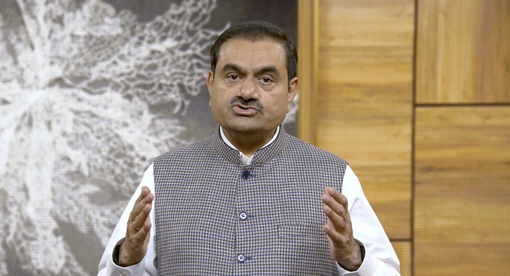 Indian billionaire Gautam Adani addressing investors from an unknown location.