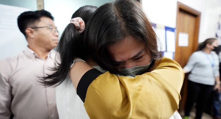 Voice of Democracy journalist Lim Thida cries after the broadcaster was closed