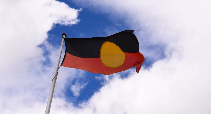 An Aboriginal flag in Canberra (Image: AAP/Lukas Coch)