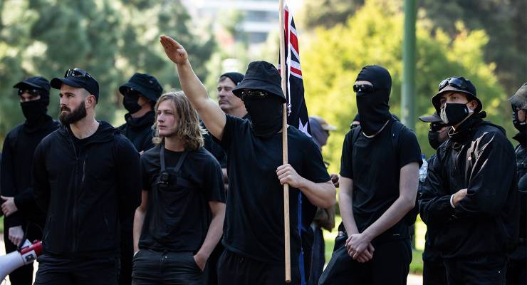 Neo-Nazi protesters in Melbourne, 2023 (Image: AAP/Diego Fedele)