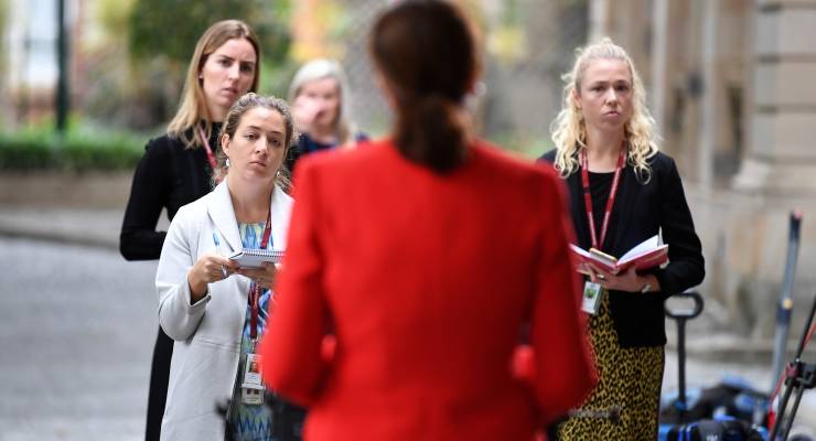 Female reporters interview Queensland Premier Annastacia Palaszczuk