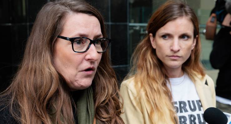 Climate activist Kristen Morrissey (left) talks to the media outside the Perth Magistrates Court (Image: AAP/Richard Wainwright)