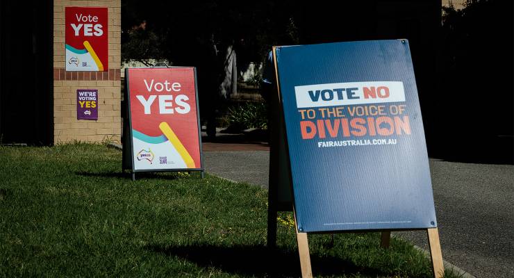 Signs outside a pre-polling station for the Indigenous Voice to Parliament referendum (Image: AAP/Richard Wainwright)