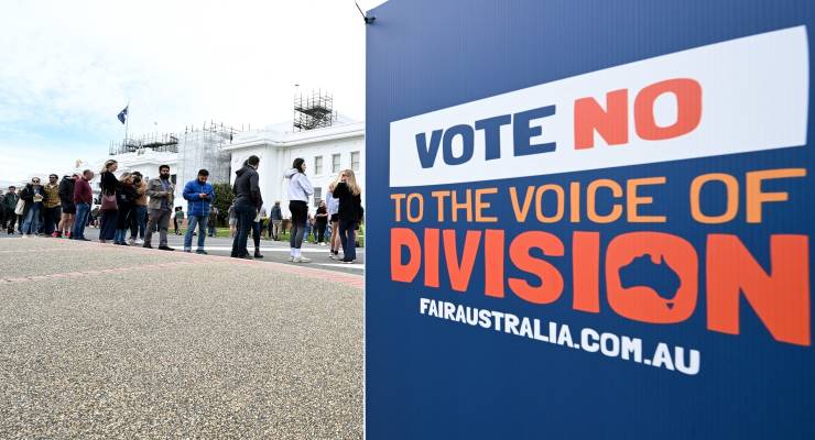 Voice to Parliament Referendum voters queuing outside the voting centre at Old Parliament House, Canberra, next to a "Vote No" corflute