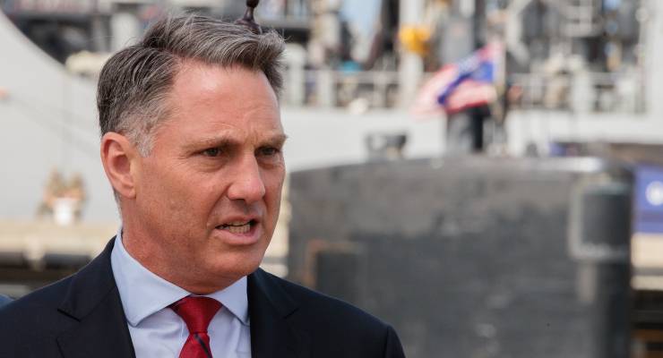 Richard Marles in front of the USS Asheville nuclear-powered submarine (Image: AAP/Richard Wainwright)