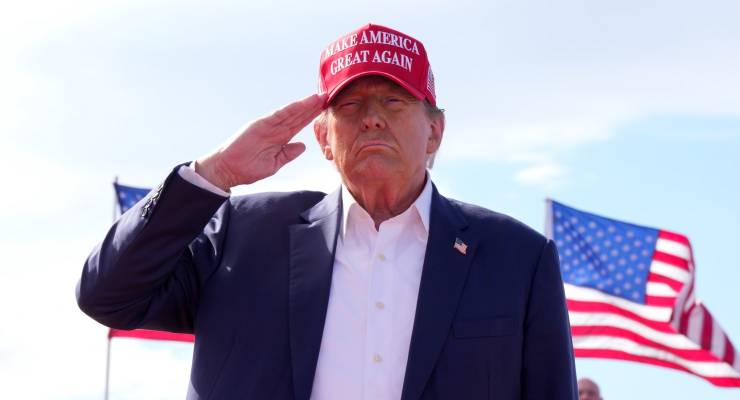 Donald Trump salutes at a campaign rally in Ohio (Image: AP/Jeff Dean)
