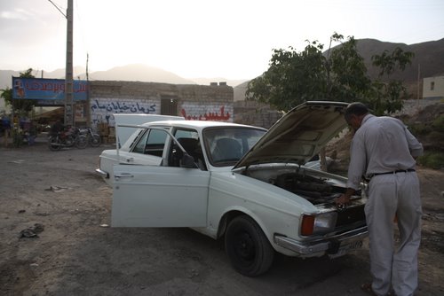 Hossein cooling down the Paykan.