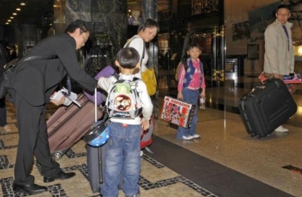 Officials assist stranded Viva Macau passengers at Macau airport, Macau Daily Times