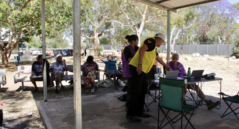 AEC officials run the polling booth inside Ilyiperenye (Old Timers) town camp (Image: Julia Bergin)